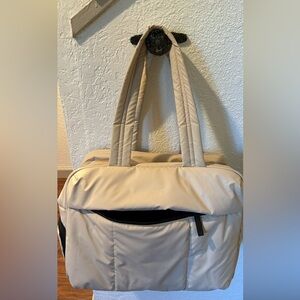 Calpak Luka Duffel in Oatmeal.